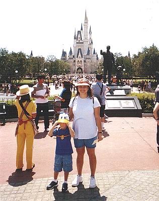 Sheila and Austin in front of Cinderella's Castle.