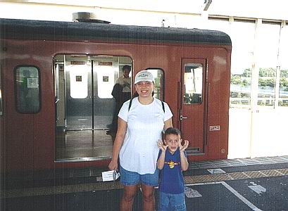 Sheila, Austin, and the train we took to Disneyland.